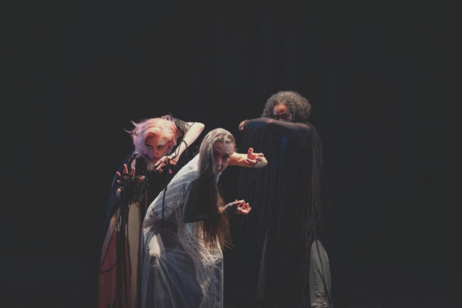 Acting workshop participant demonstrating emotional expression on stage